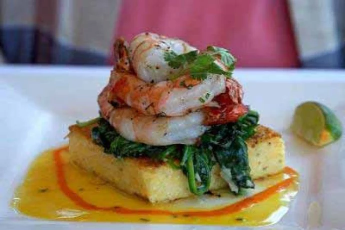 Polenta square with shrimps on top