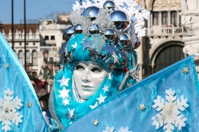 Person dressed up in costume and mask for Venice Carnival