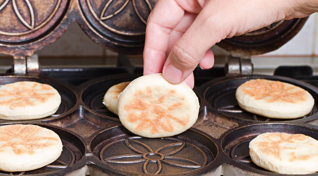 An Italian cooking his own Tigelle Montanare