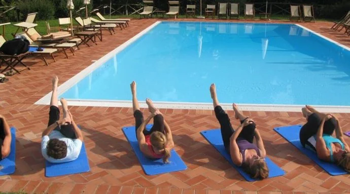 Working out next to the poolside in the Italian sun