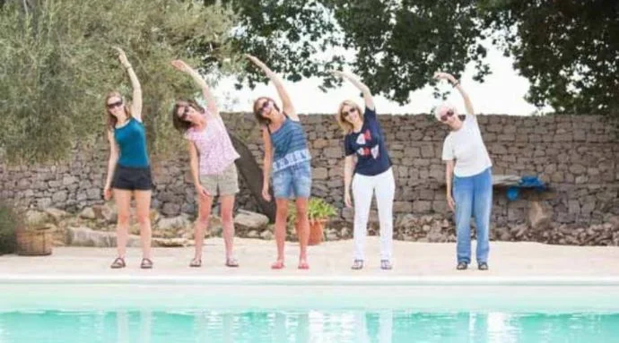 Stretching out by the poolside in Italy